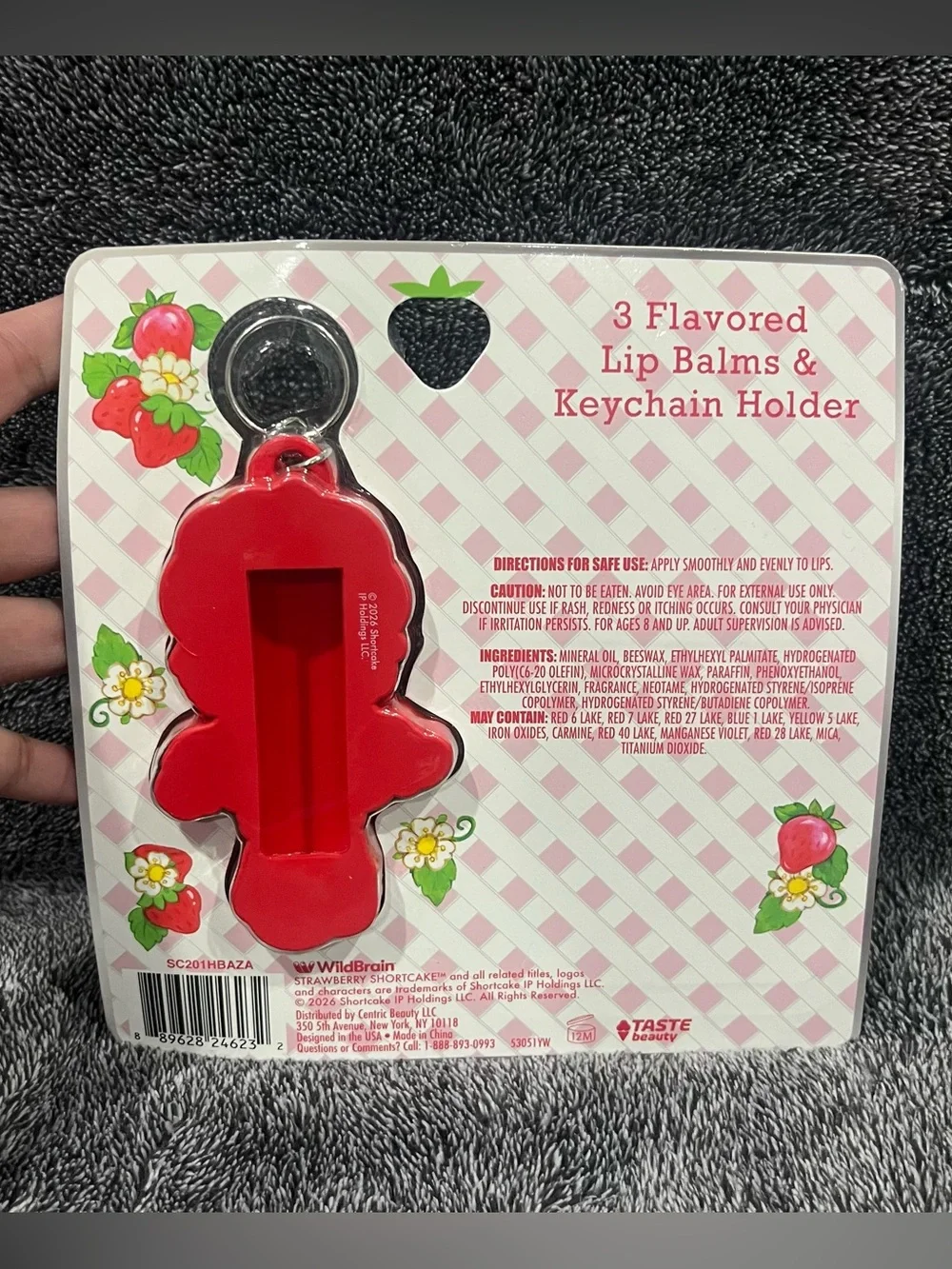 Strawberry Shortcake flavored lip balm set includes a keychain holder